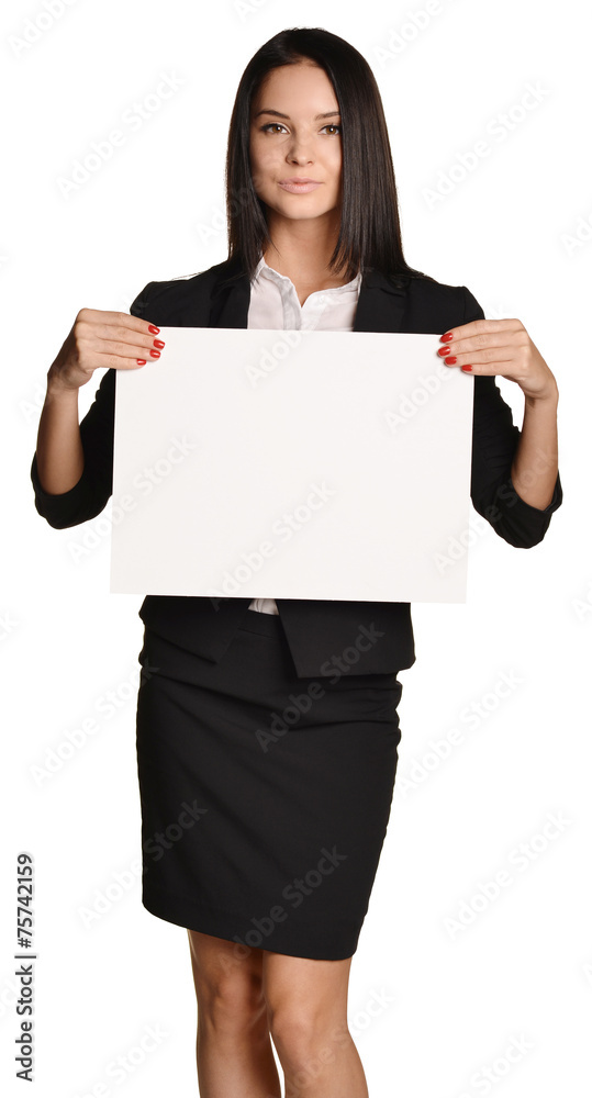 Business woman holding in hand a blank sheet of white cardboard Business woman holding in hand a blank sheet of white cardboard