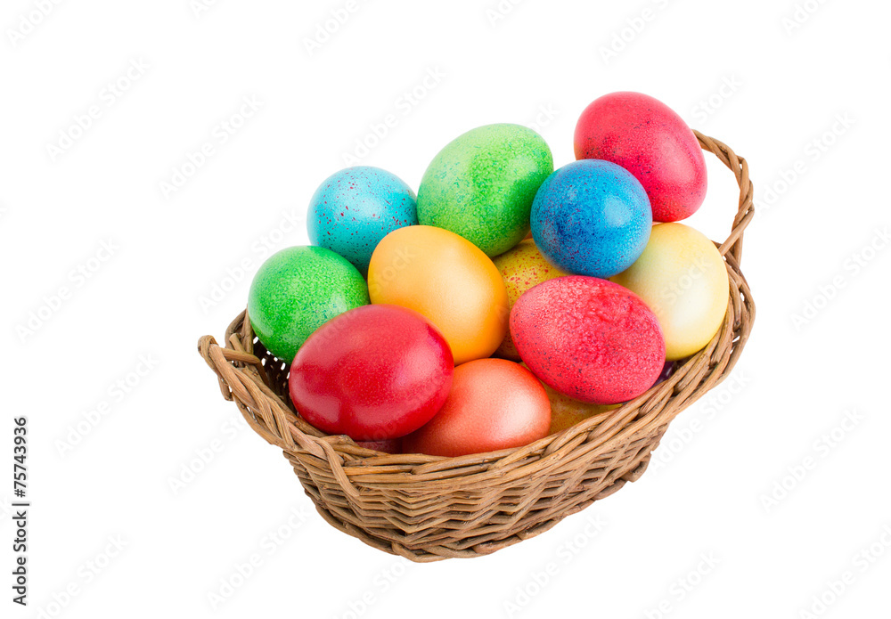 Colorful easter eggs in basket. Isolated Colorful easter eggs in basket. Isolated