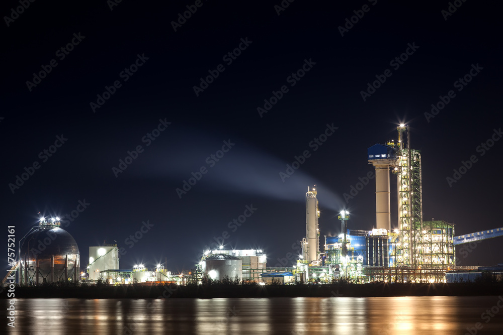 panorama of Oil refinery with reflection, petrochemical plant