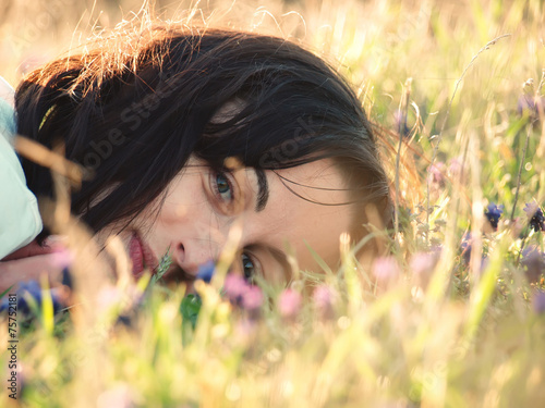 Girl in a field of flowers.