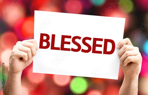 Blessed card with colorful background with defocused lights photo