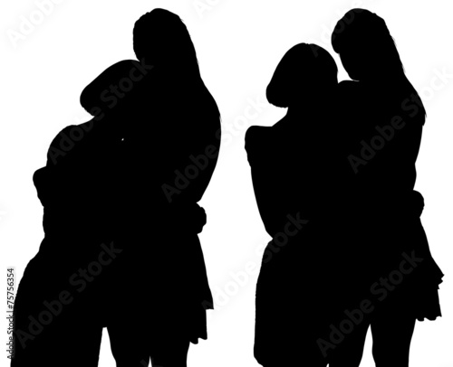 silhouette of two young women