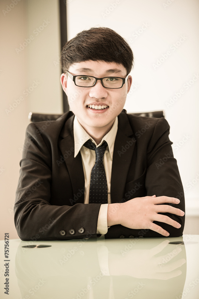 Image of young handsome confident businessman in suit Image of young handsome confident businessman in suit