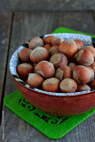 Hazelnuts in the ceramic bowl