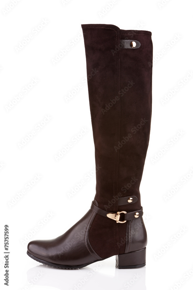 Elegant female knee high boot isolated on white Elegant female knee high boot isolated on white