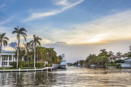 luxurious waterfront homes and yachts at the canal in Fort Laude photo