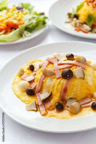 Creamy omelet with ham and mushroom.