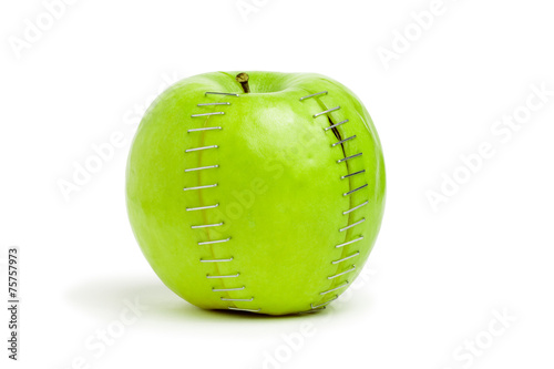 stapled green apple