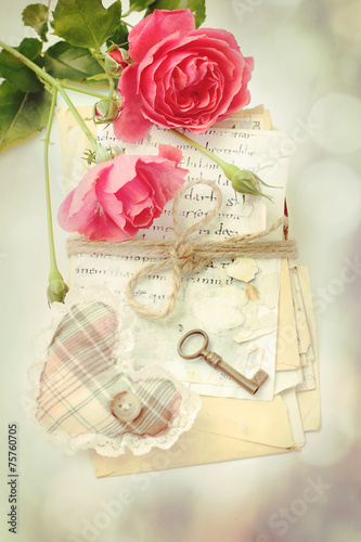 heart symbol of love,key and rose buds in vintage style photo