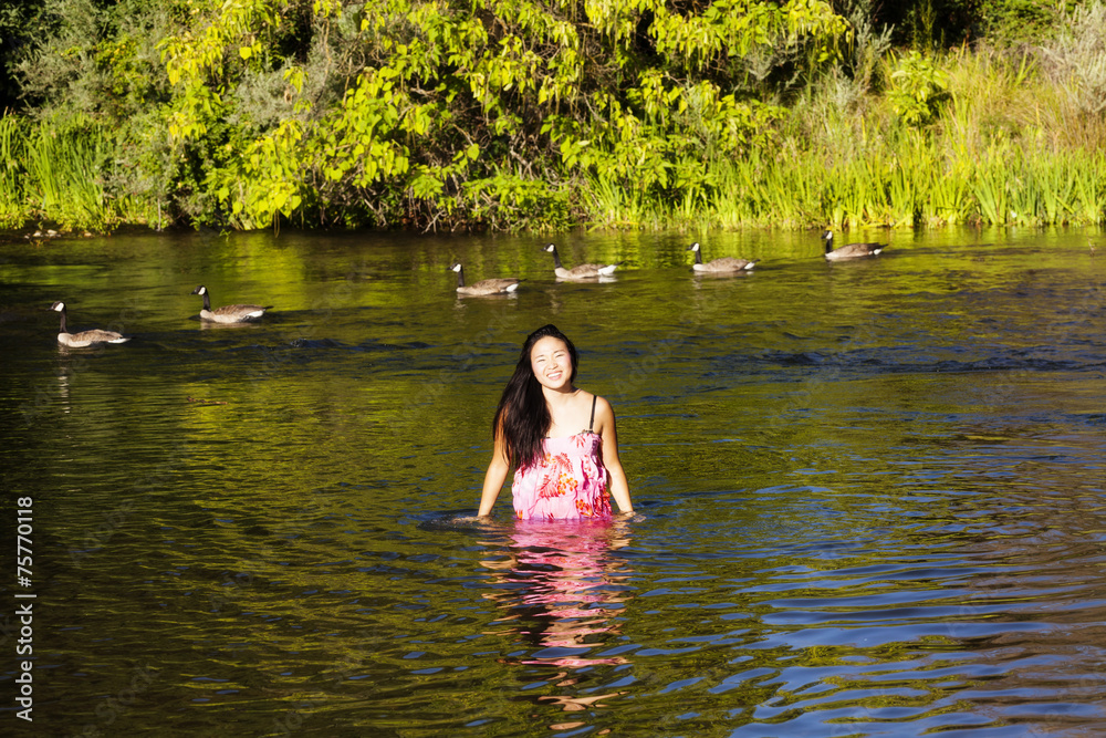 Fototapeta premium Young Attractive Japanese Woman Portrait Standing River