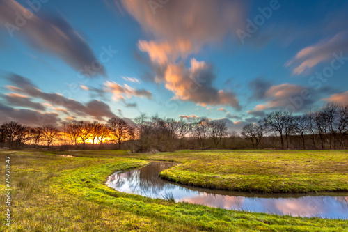 Orange Sunset over River Landscape photo