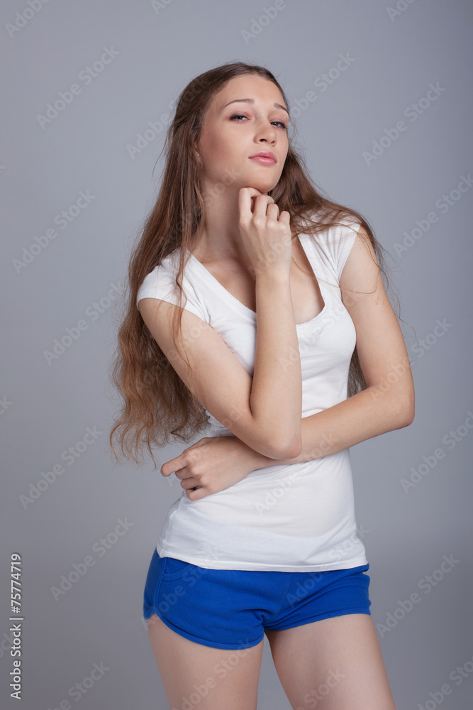Image of pretty girl with sly look on her face Image of pretty girl with sly look on her face