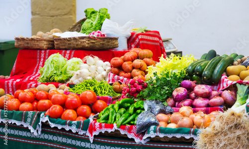  Tomatoes and other vegetables on   counter