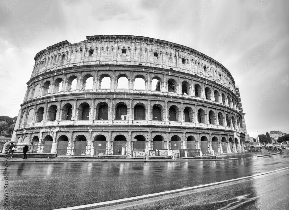 Rome, the Colosseum with wet street