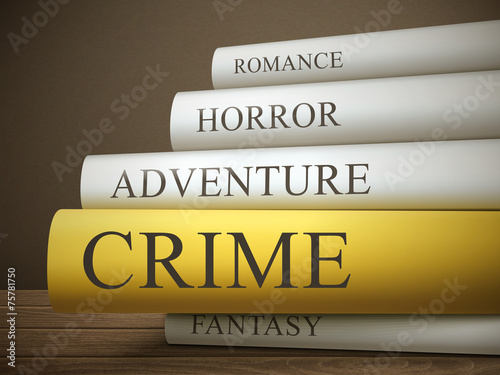book title of crime isolated on a wooden table