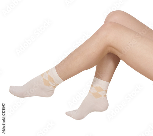 Female legs in socks. Isolated on white