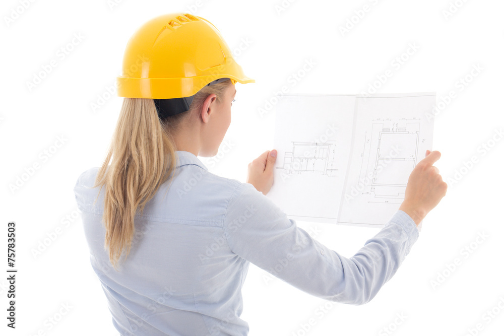 back view of business woman in yellow builder helmet holding bui back view of business woman in yellow builder helmet holding bui