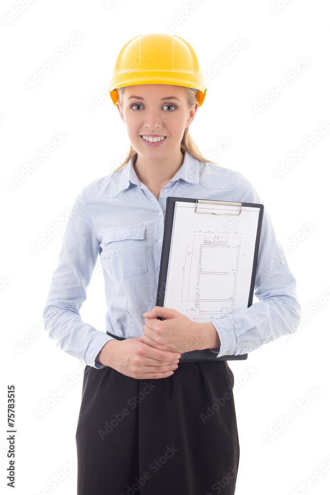 business woman in builder helmet holding clipboard with building business woman in builder helmet holding clipboard with building