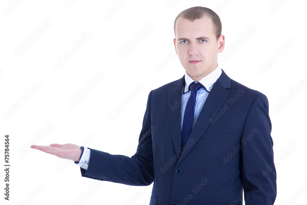 young handsome business man presenting a copyspace isolated on w young handsome business man presenting a copyspace isolated on w