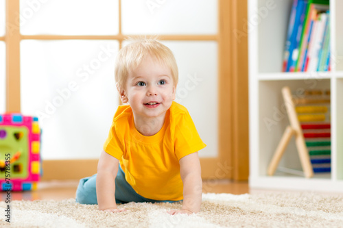 crawling baby boy indoors
