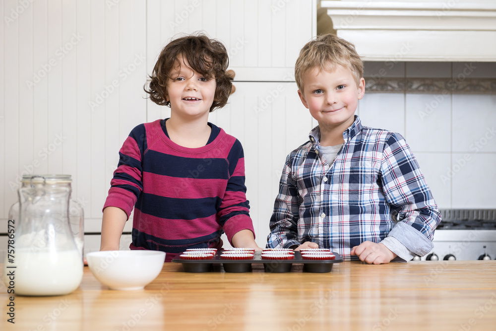 Smiling children Preparing Cupcake In Kitchen Smiling children Preparing Cupcake In Kitchen