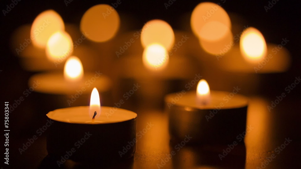 warm candles burning in the dark, shoot in raw warm candles burning in the dark, shoot in raw