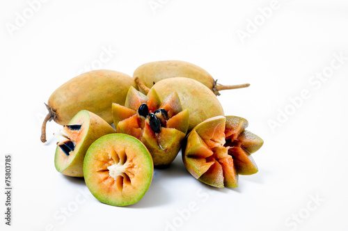 Fresh sapodillas isolated on white background photo