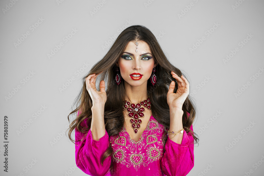 Young pretty woman in indian red dress Young pretty woman in indian red dress