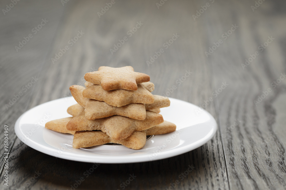 homemade star shape ginger cookies on wood table homemade star shape ginger cookies on wood table