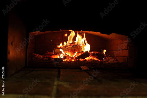 Burning wood in an oven