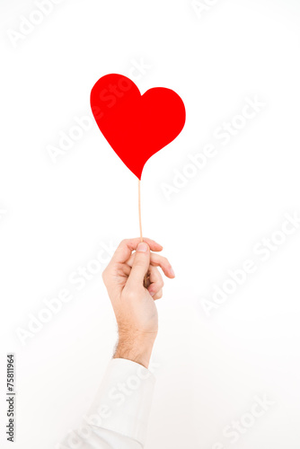 hand holding an heart vertical