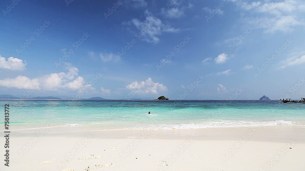 Young lady running into tropical sea Young lady running into tropical sea