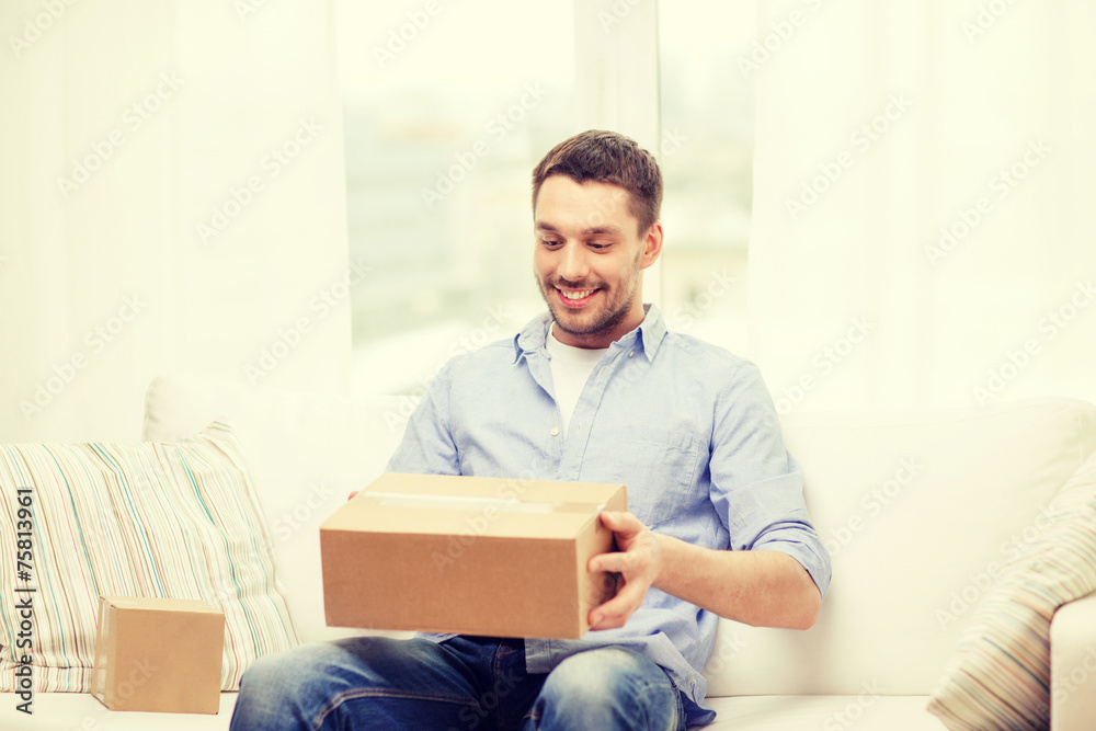 man with cardboard boxes at home man with cardboard boxes at home