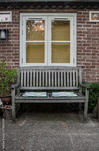 Bench and Window in Garden