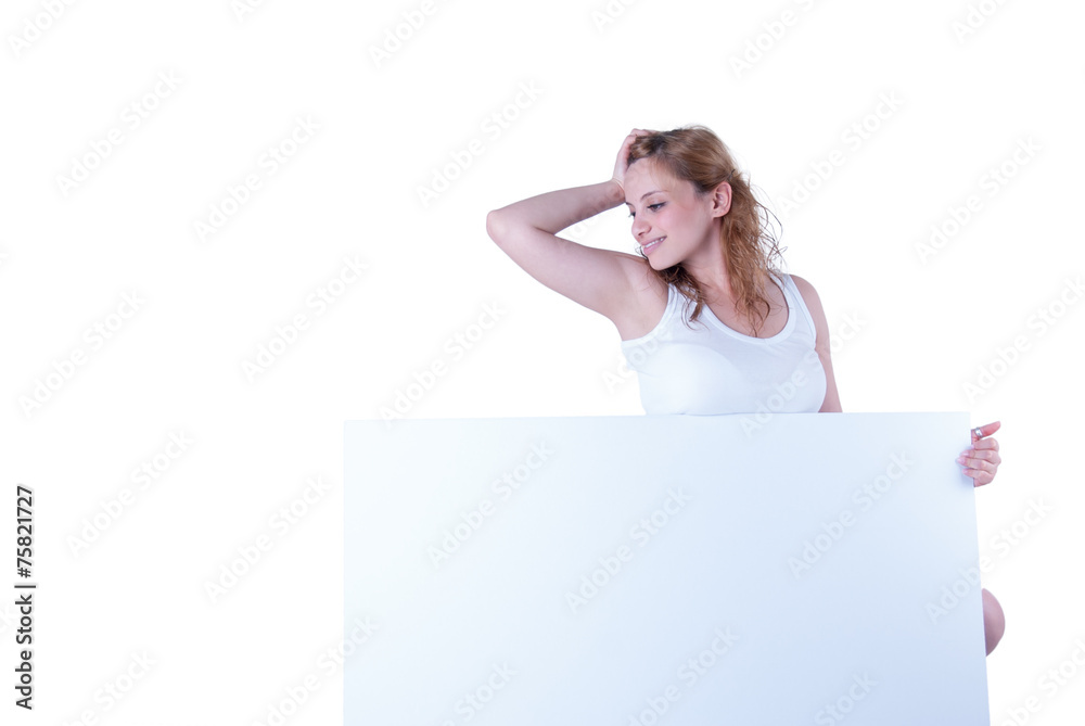 Young woman posing with a placard Young woman posing with a placard
