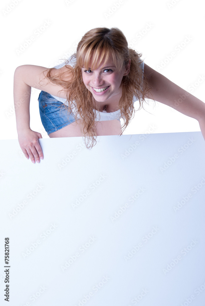 Young woman posing with a placard Young woman posing with a placard