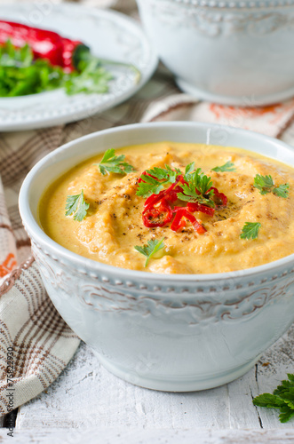 Carrot cream soup with red chili pepper