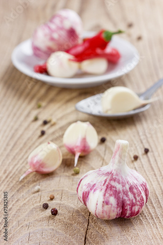 garlic whole and cloves with peppercorns and chili pepper