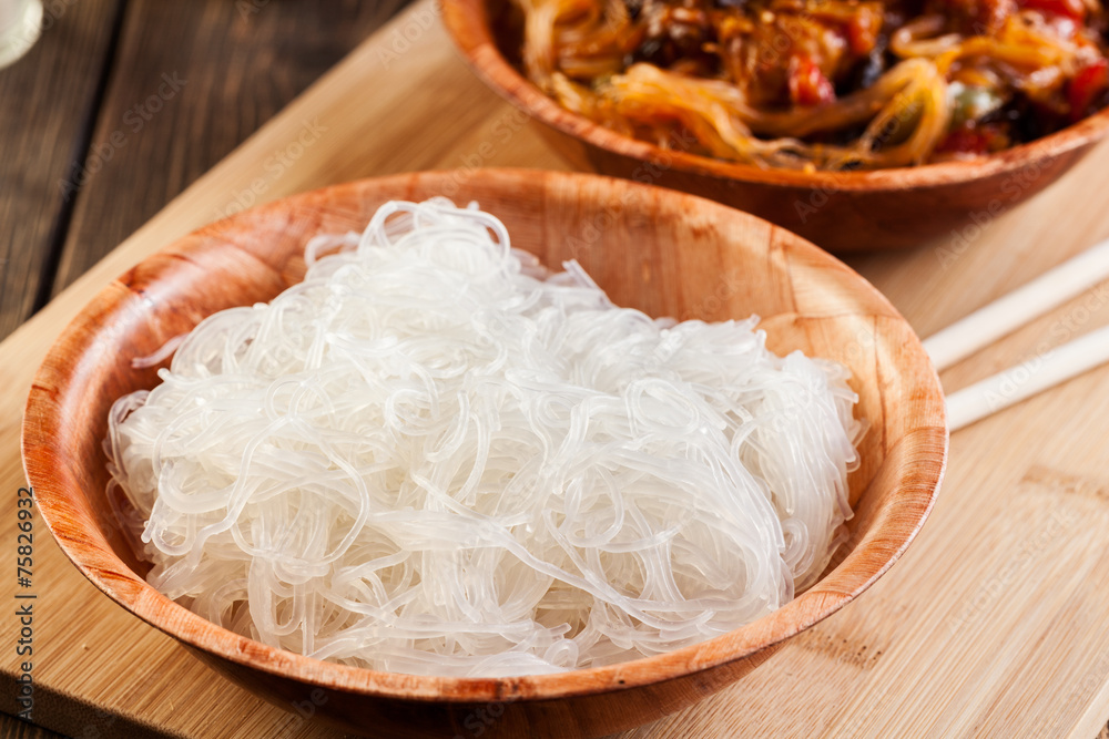 Bowl of rice noodles on table