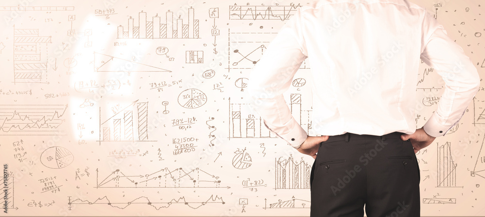 Businessman with diagrams and graphs Businessman with diagrams and graphs