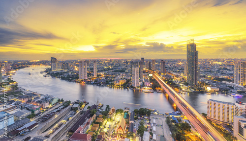 Landscape of River in Bangkok city in night time with bird view. photo