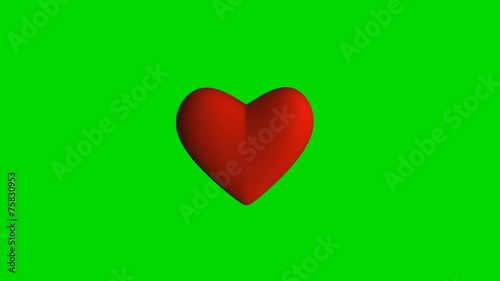 Red heart on green background loopable
