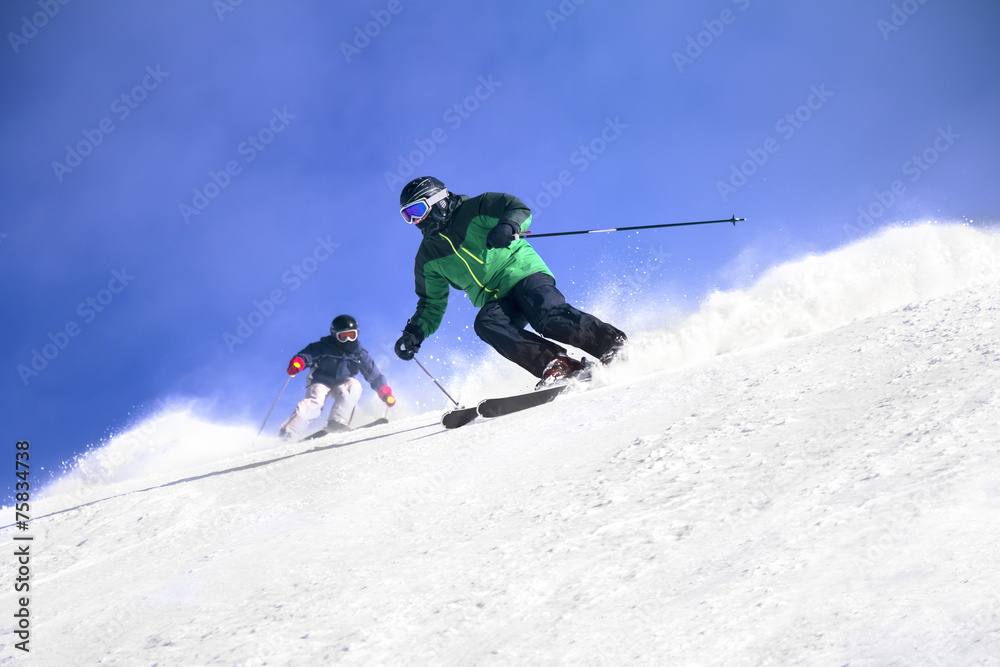 Two Skiers skiing
