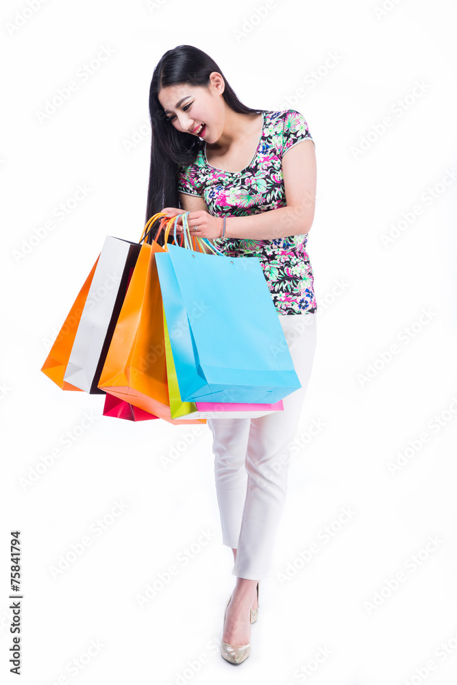 young woman with shopping bags over white background young woman with shopping bags over white background