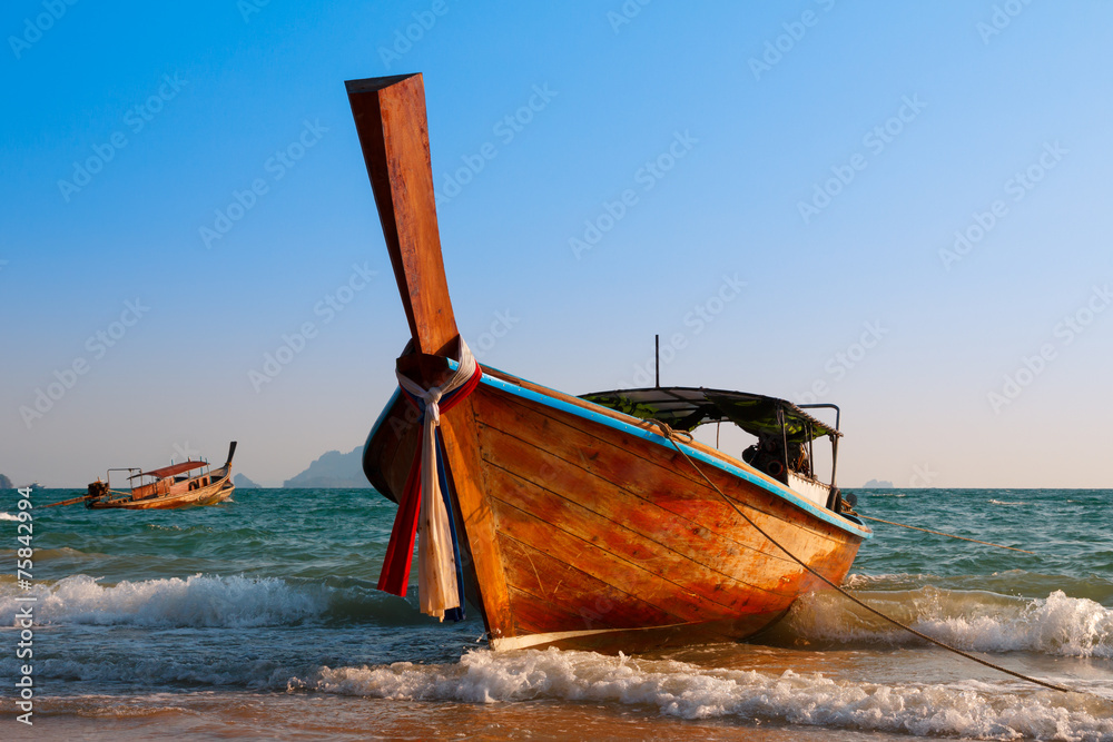 Traditional longtail wooden boat at Andaman sea Traditional longtail wooden boat at Andaman sea