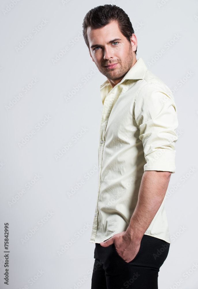 Fototapeta premium Portrait of the young beautiful man.