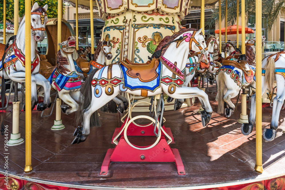 Fototapeta premium Carousel horses on a Merry-go-round