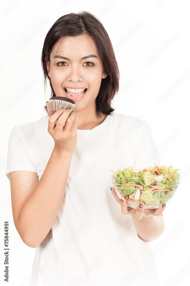 Pretty girl eating fresh vegetable salad Pretty girl eating fresh vegetable salad