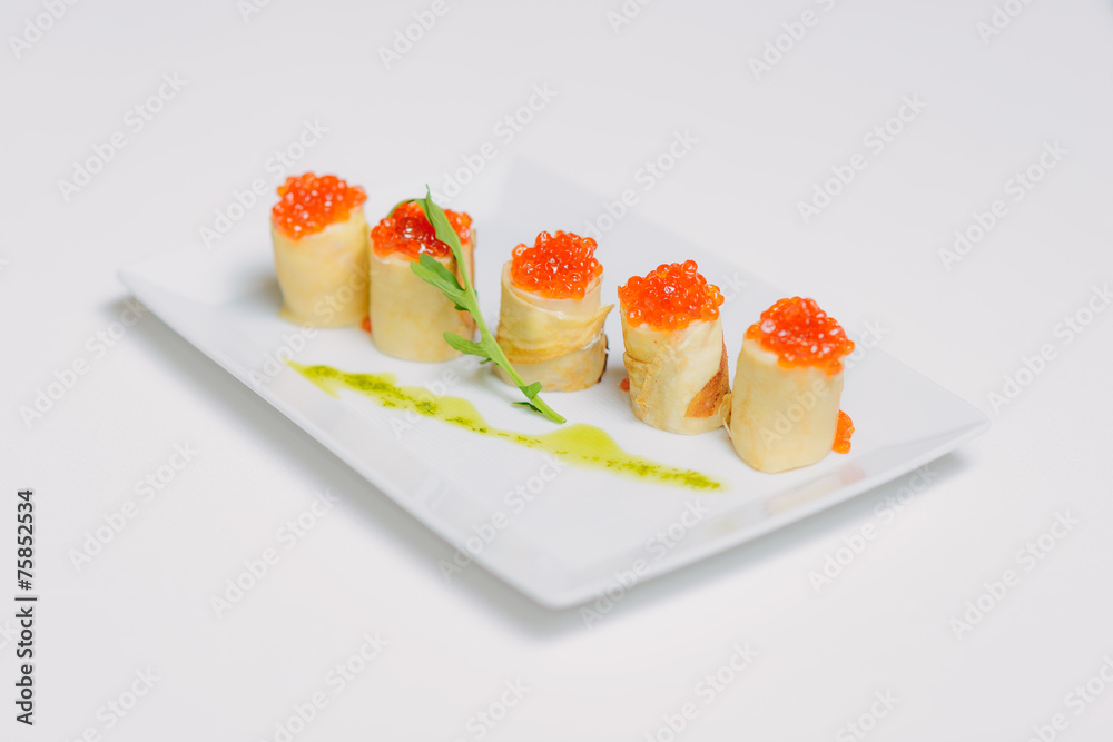 Crepes with salmon caviar and cheese