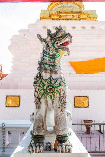 Ancient statue at Falang temple photo